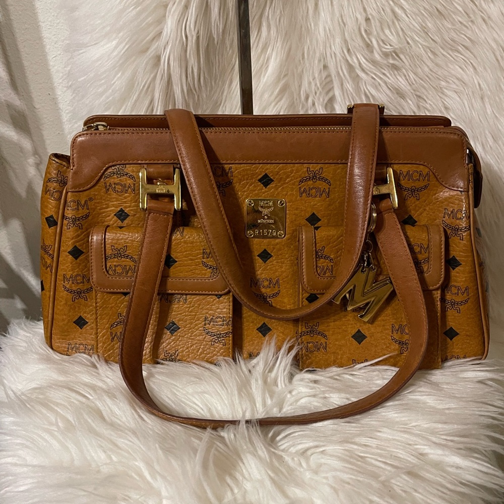 MCM Cognac Visetos with 2 Pocket Shoulder Bags. Discoloration on the bottom.